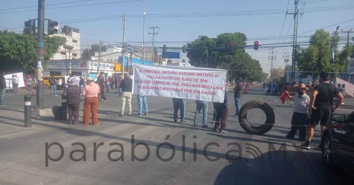 Exigen campesinos de San Baltazar Campeche pago de tierras; bloquean vialidades